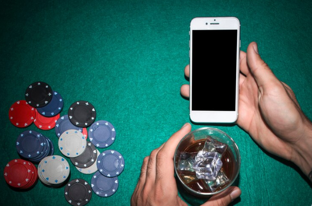 https://www.freepik.com/free-photo/poker-player-s-hand-showing-mobile-phone-holding-whiskey-glass-poker-table_2914520.htm#fromView=search&page=1&position=2&uuid=c17db70a-4857-4c26-a271-ffdc4d3d734c