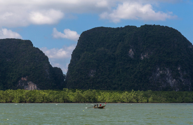 Ilustrasi Pulau Terdekat dari Muara Angke. Foto: Unsplash/Cem Sagisman.