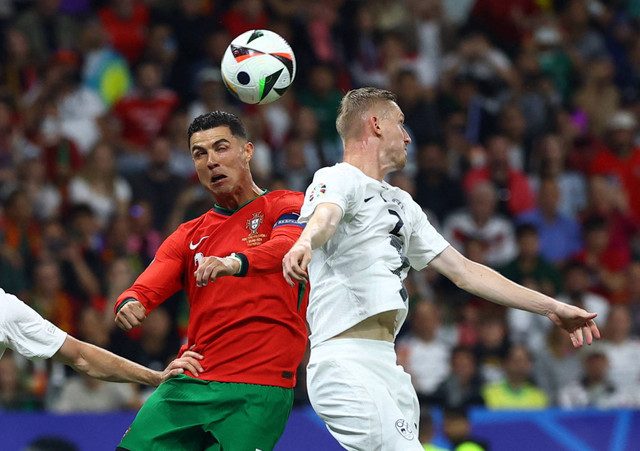 Cristiano Ronaldo saat Portugal hadapi Slovenia di 16 besar Piala Eropa, Selasa (02/07/2024) dini hari WIB. Foto: Kai Pfaffenbach/REUTERS