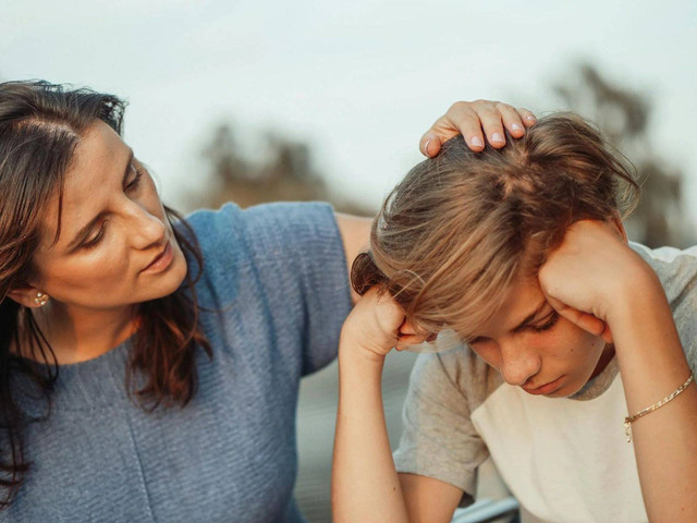 Photo by Kindel Media: https://www.pexels.com/photo/woman-in-blue-shirt-talking-to-a-young-man-in-white-shirt-8550841/