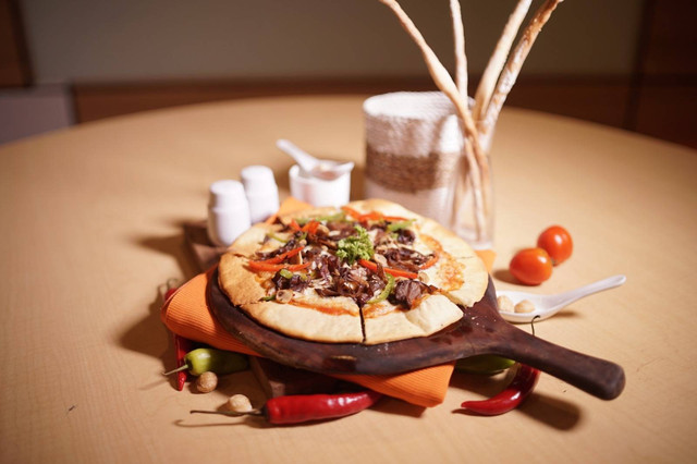 Ilustrasi pizza. Foto: Dok. Hotel Harris Pontianak