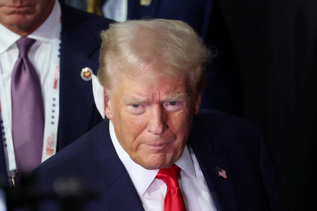 Capres Amerika Serikat dari Partai Republik Donald Trump menghadiri hari pertama Konvensi Nasional Partai Republik 2024 di Fiserv Forum, Milwaukee, Wisconsin, Amerika Serikat, Senin (15/7/2024). Foto: Mike Segar/ REUTERS