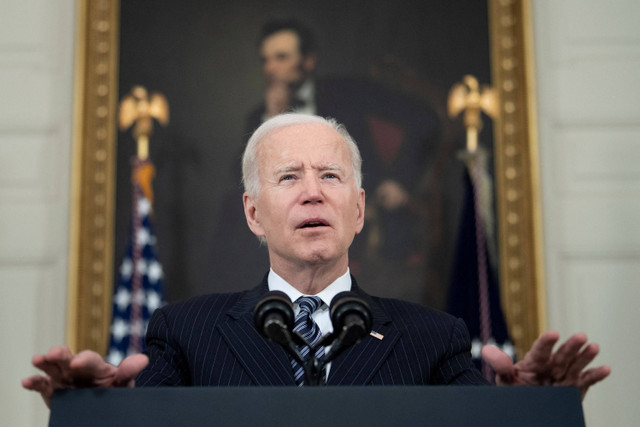 Presiden AS Joe Biden memberikan keterangan pers pembaruan vaksinasi dari Ruang Makan Negara di Gedung Putih, AS pada 6 April 2021. Foto: BRENDAN SMIALOWSKI / AFP