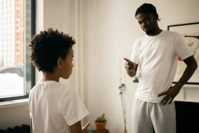 Photo by Monstera Production: https://www.pexels.com/photo/young-black-father-edifying-calm-son-at-home-7114229/