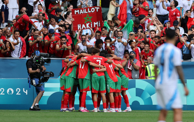 Laga Maroko vs Argentina di Olimpiade. Foto: Thaier al-Sudani/Reuters