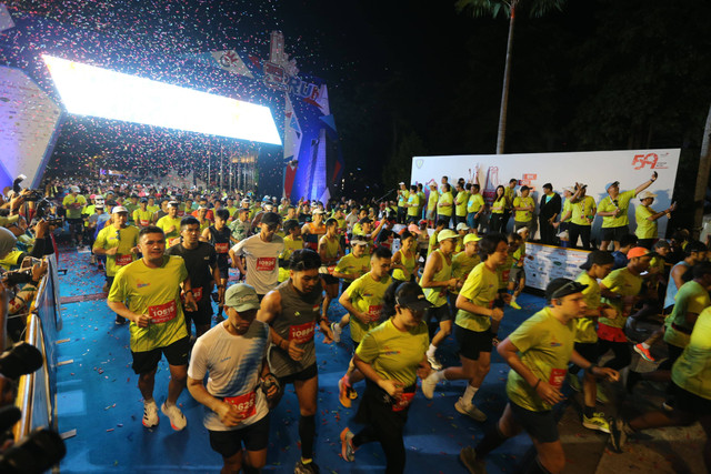 Peserta lomba lari Telkom Digiland Run 2024. Foto: Aditia Noviansyah/kumparan