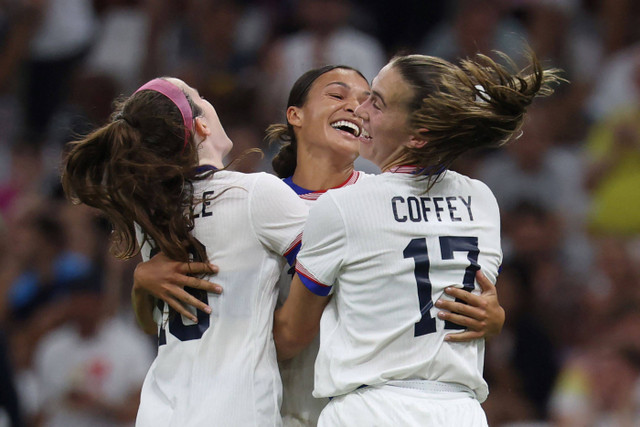 Pemain Amerika Serikat merayakan gol ke gawang Jerman di Olimpiade.  Foto: Pascal Guyot/AFP