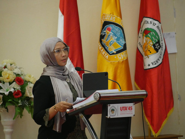 Nurul Wahda dalam sidang terbuka promosi Doktor Ilmu Hukum. Dok: Pribadi