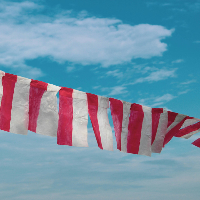 Foto: flag and sky oleh Tusik Only https://unsplash.com/photos/red-and-white-striped-flag-under-blue-sky-during-daytime-TfKRjLmlIVQ