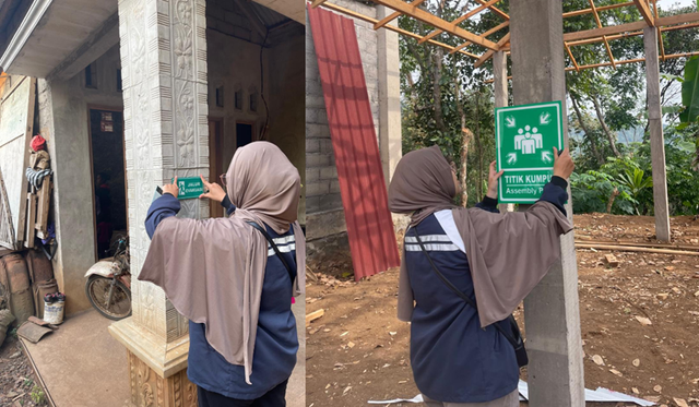 Mahasiswa KKN Undip melakukan pemasangan rambu jalur evakuasi dan titik kumpul pada daerah rawan longsor di Desa Banjarsari (Foto: Dok. Ulima Atma Haamidah)