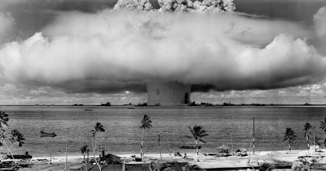 A nuclear test gives a large mushroom cloud rising from an atomic explosion over a body of water. File: pexels.com