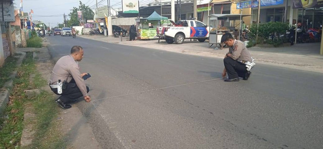 Satlantas Polresta Bandar Lampung saat melakukan olah TKP. | Foto: Satlantas Polresta Bandar Lampung