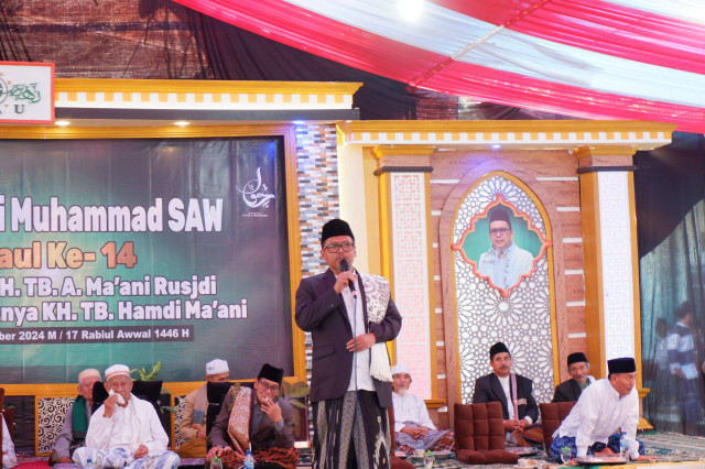 Sambutan KH. Uuf Zaki Ghufron, Pengasuh Pondok Pesantren MALNU Pusat Menes. 