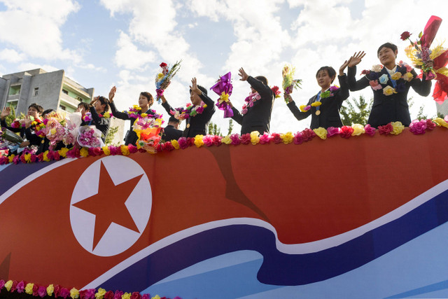 Penyambutan pemain Timnas Wanita Korut yang baru saja memenangi Piala Dunia Wanita U-20. Foto: Kim Won Jin/AFP