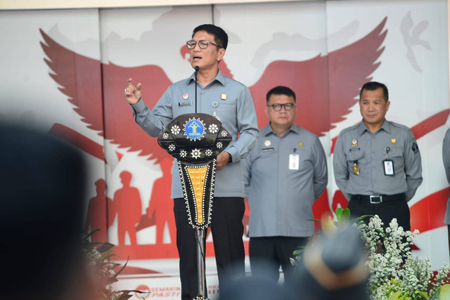 Sekretaris Jenderal Kementerian Hukum dan Hak Asasi Manusia Republik Indonesia, Komjen. Pol. Dr. Nico Afinta, S.I.K., S.H., M.H. (depan)