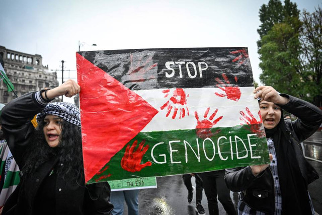 Marchers in Bucharest, Romania, Nov. 4. Daniel Mihailescu/AFP via Getty Images