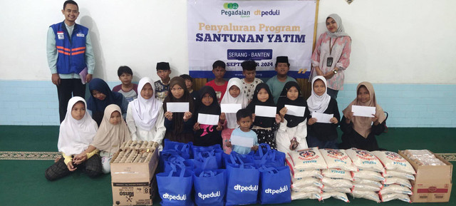 Cinta dari Pegadaian Syariah Kepandean, Bahagiakan Puluhan Yatim di Serang