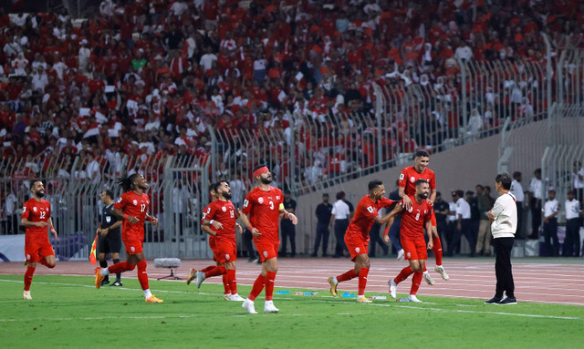 Selebrasi pemain Timnas Bahrain usai mencetak gol ke gawang Timnas Indonesia pada pertandingan Grup C Ronde 3 Kualifikasi Piala Dunia 2026 di Stadion Nasional Bahrain, Riffa, Bahrain, Kamis (10/10/2024). Foto: Hamad I Mohammed/REUTERS