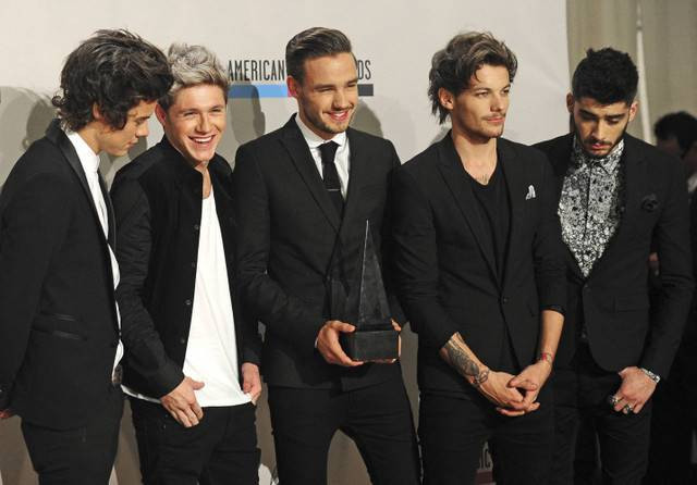  Ilustrasi Biodata One Direction. Foto: Frederic J. BROWN/AFP.