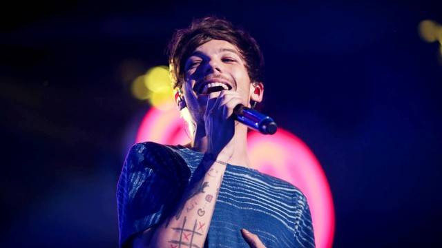 Ilustrasi Biodata Louis Tomlinson, Perjalanan Karier, dan Fakta Menariknya. Foto: Christopher Polk/Getty Images.