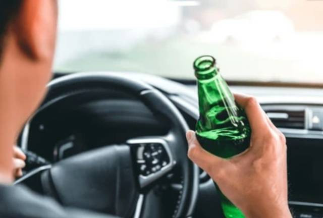 https://www.shutterstock.com/image-photo/drunk-man-driving-car-on-road-2455831591