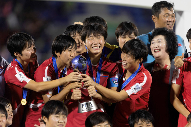 Selebrasi pemain Timnas Wanita Korea Utara usai mengalahkan Timnas Wanita Spanyol pada pertandingan final Piala Dunia Wanita U-17 2024 di Stadion Olimpico Felix Sanchez di Santo Domingo, Minggu (3/11/2024). Foto: Nelson Pulido / AFP