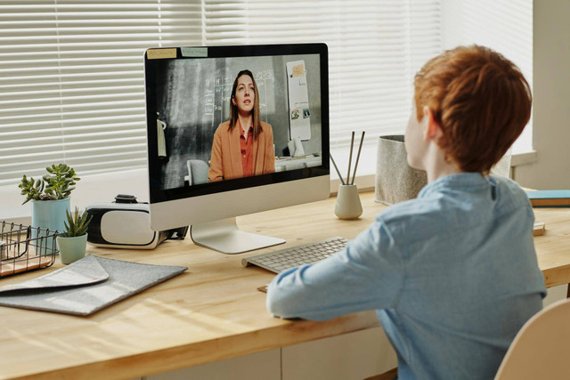 Photo by Julia M Cameron: https://www.pexels.com/photo/photo-of-child-sitting-by-the-table-while-looking-at-the-imac-4145153/