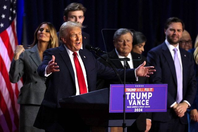 Calon presiden dari Partai Republik Donald Trump menyampaikan pidato kemenangan Pemilu AS 2024 di Palm Beach County Convention Center, West Palm Beach, Florida, AS, Rabu (6/11/2024). Foto: Carlos Baria/ REUTERS