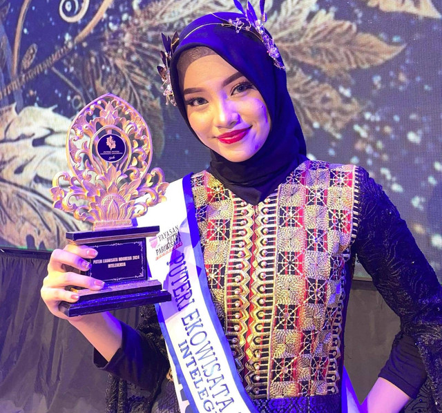 Siswi Madrasah Aliyah Negeri (MAN) 2 Bandar Lampung, Tourine Shabira Amira, siswa kelas XII IPS 2, yang berhasil Juara Puteri Ekowisata Intelejensia Indonesia 2024 | Foto : Ist