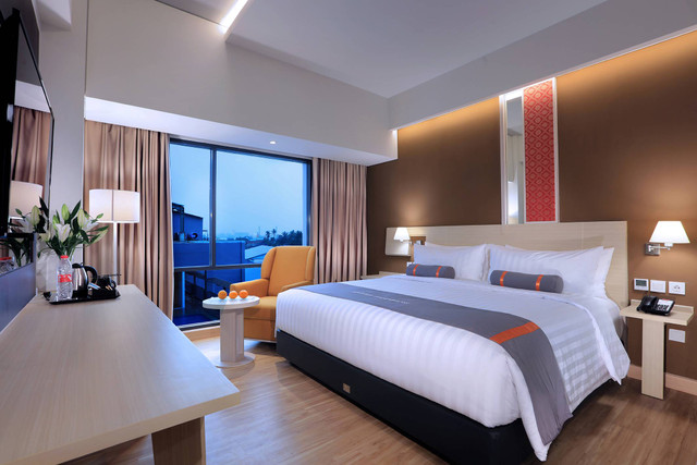 Deluxe Premier Room di Harper Palembang. Foto: Archipelago