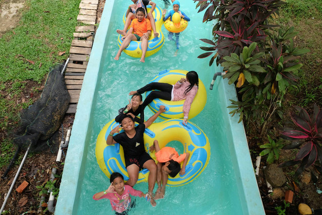 Waterpark di Batam. Foto hanya ilustrasi, bukan tempat sebenarnya. Sumber: Unsplash/Yoga Sukma