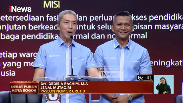 Paslon nomor urut 03 Dedie A Rachim dan Jenal Mutaqim mengikuti Debat Pilwalkot Kota Bogor 2024 di Bogor, Senin (11/11/2024). Foto: Youtube/KPU KOTA BOGOR