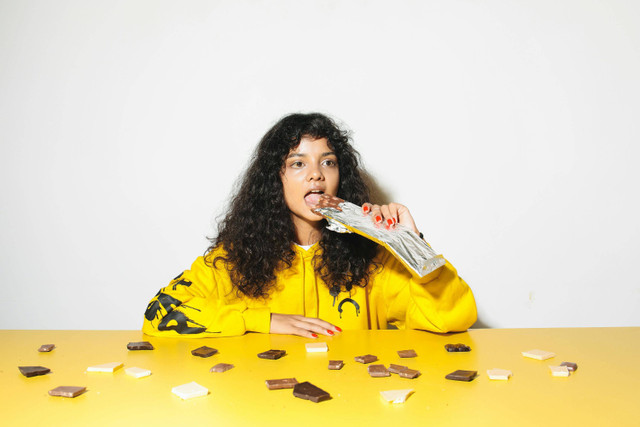 Photo by Polina Tankilevitch from Pexels: https://www.pexels.com/photo/girl-in-yellow-jacket-eating-a-chocolate-5469117/