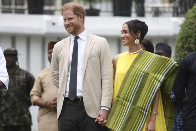 Pangeran Harry dan Meghan Markle. Foto: Kola Sulaimon/AFP