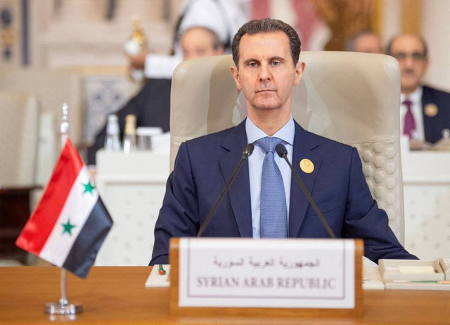 Potret Presiden Suriah Bashar Al-Assad. Foto: Saudi Press Agency via Reuters