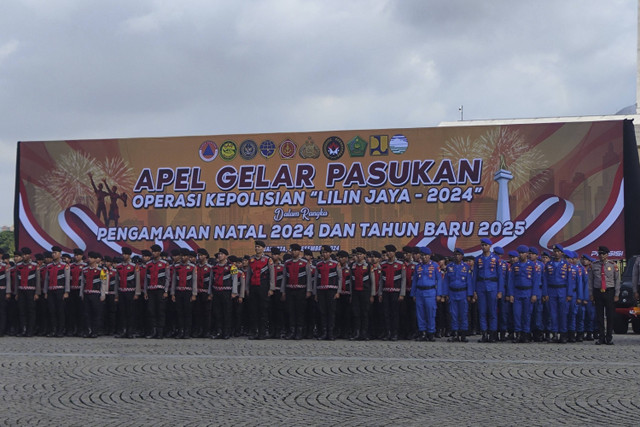 Apel Gelar Pasukan Operasi Lilin Jaya 2024 di Silang Monas, Jakarta Pusat, Jumat (20/12/2024). Foto: Jonathan Devin/kumparan