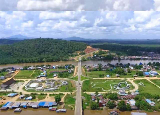 Kota Sanggau tampak dari atas. Kabuapten Sanggau dinobatkan sebagai daerah yang miliki udara paling bersih se-Indonesia. Foto: Dok. Instagram @gnfi