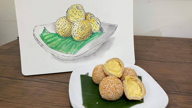 menikmati sambil membuat sketsa kala liburan, pagi hari. hujan - hujan menemukan kehangatan di Pasar Oro Oro Dowo (sketsa by Aditya, photo by A. Afandi)