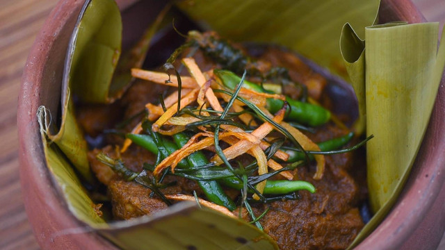 Ilustrasi Fakta Unik Rendang, Foto:Unsplash/Christian Dala