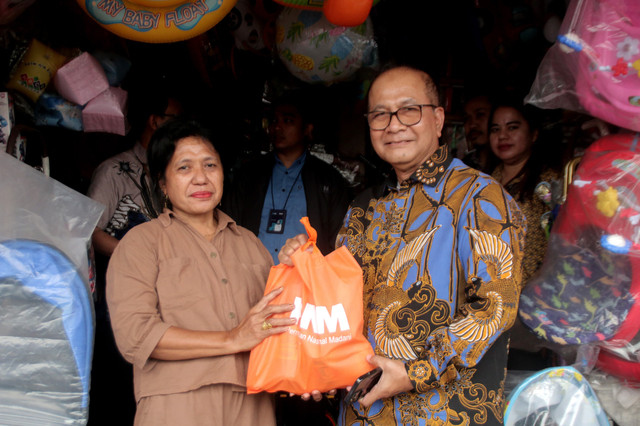 Sekretaris Menteri UMKM sekaligus Komisaris Utama PNM, Arif Rahman Hakim (kanan). Foto: Dok. PNM