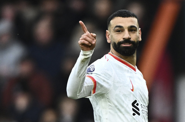 Pemain Liverpool Mohammed Salah berselebrasi usai mencetak gol ke gawang Bournemouth pada pertandingan Liga Premier Inggris di Vitality Stadium, Bournemouth, Inggris, Sabtu (1/2/2025). Foto: Paul Childs/REUTERS