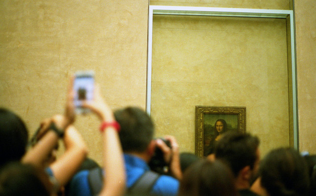 Photo by Jill Evans from Pexels: https://www.pexels.com/photo/selective-focus-photo-of-group-of-people-taking-picture-of-mona-lisa-painting-2043385/