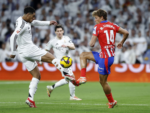 Duel Real Madrid vs Atletico Madrid tersaji dalam pertandingan lanjutan Liga Spanyol 2024/25 di Santiago Bernabeu, Minggu (9/2) dini hari WIB.  Foto: REUTERS/Juan Medina