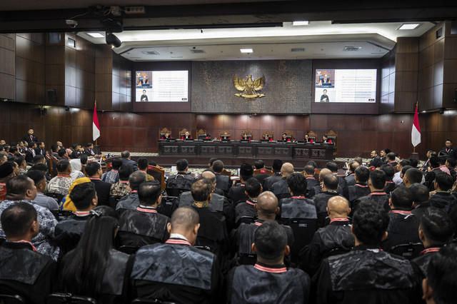 Suasana sidang pembacaan putusan sengketa Pilkada 2024 di Gedung Mahkamah Konstitusi, Jakarta, (Sumber: Kumparan)