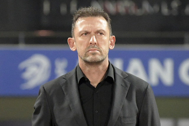 Pelatih Australia Tony Popovic. Foto: Mazen Mahdi/AFP