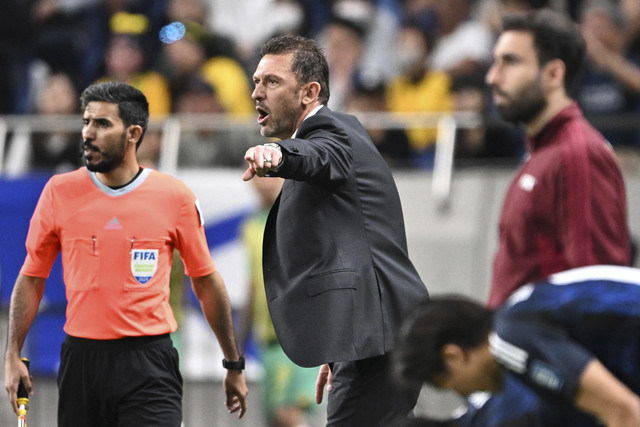 Pelatih Australia Tony Popovic. Foto: Philip Fong/AFP