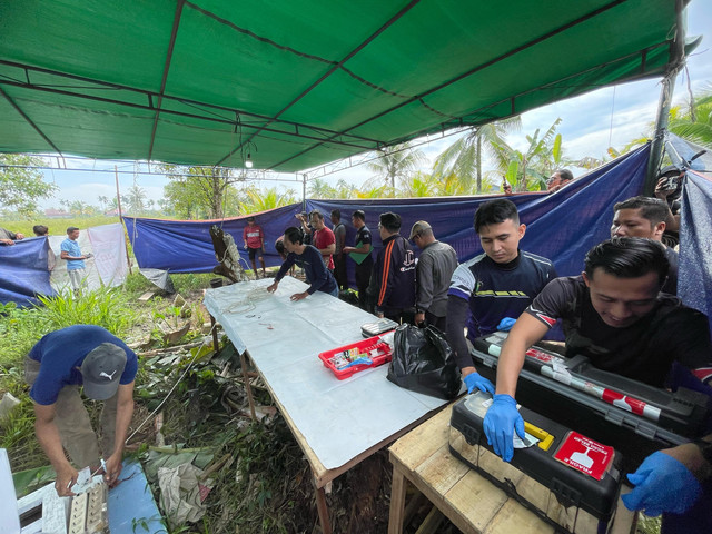 Pembongkaran makam SF korban perkelahian di Kubu Raya. Foto: Rabiansyah/Hi!Pontianak