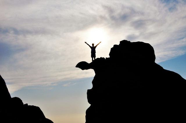 https://www.pexels.com/photo/silhouette-photography-of-person-standing-on-rock-584179/