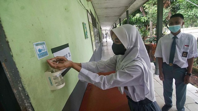 Penerapan protokol kesehatan pada sekolah di Palembang. (Foto: Ary Priyanto/Urban Id)