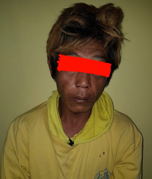 Eryanto alias Een (36 tahun), pria di Kota Pagar Alam, Sumsel, saat ditangkap polisi. (ist)